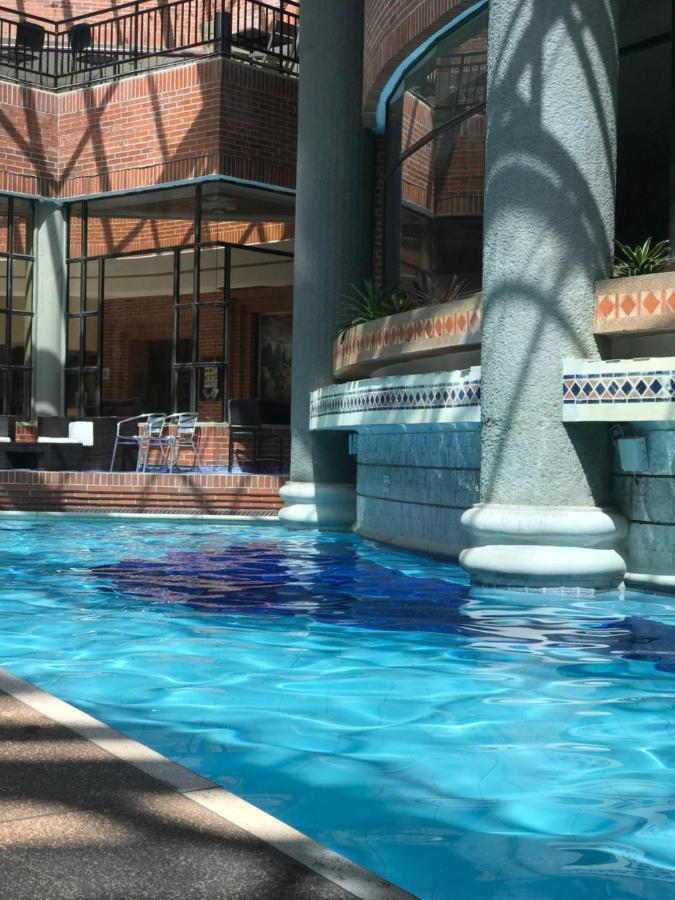 Casa Morales Hotel Internacional Y Centro De Convenciones Ibagué Zewnętrze zdjęcie The indoor pool at the hotel