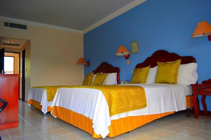 Casa Morales Hotel Internacional Y Centro De Convenciones Ibagué Zewnętrze zdjęcie A room at the hotel