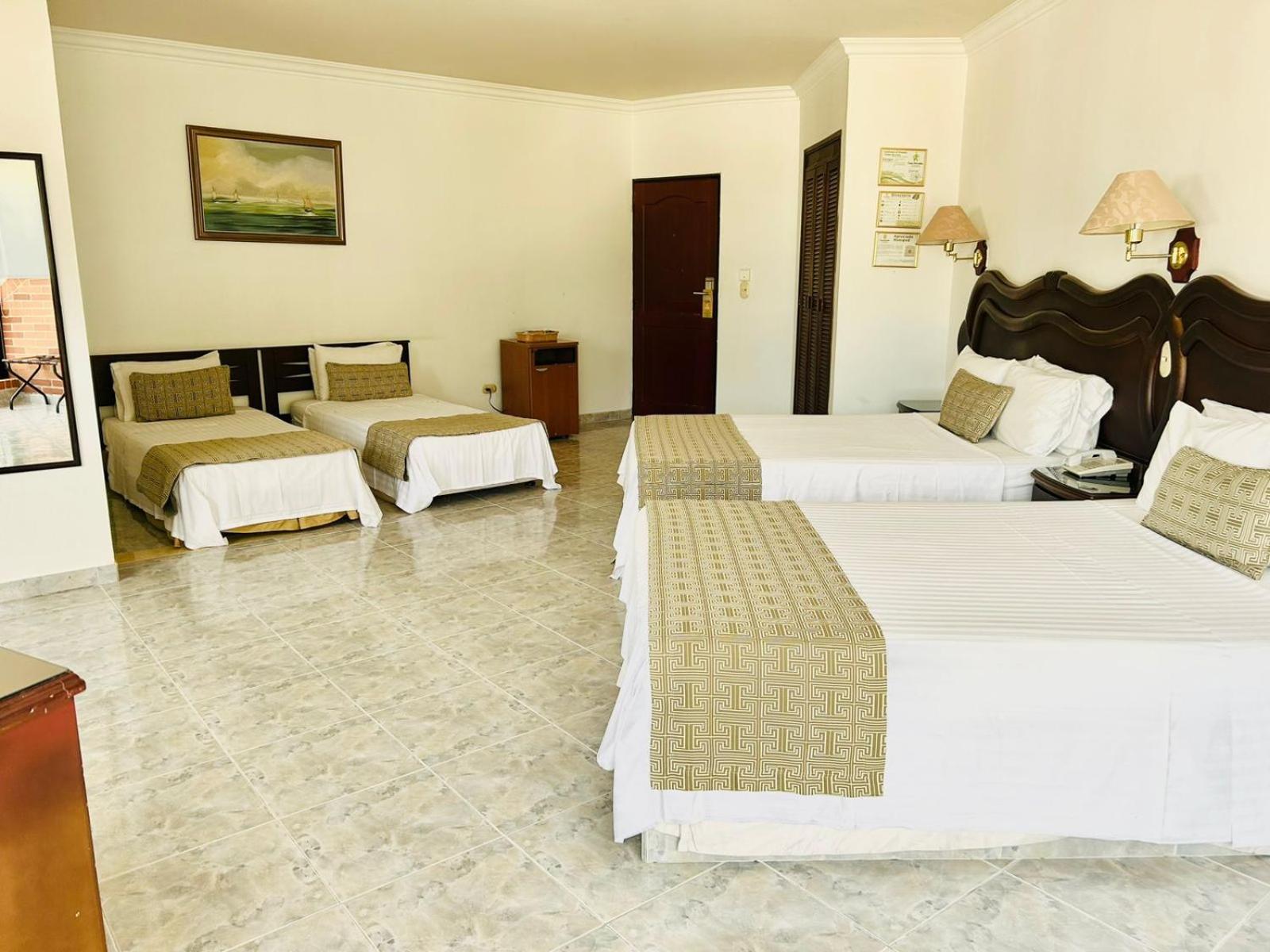 Casa Morales Hotel Internacional Y Centro De Convenciones Ibagué Zewnętrze zdjęcie A room at the hotel