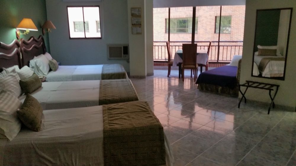 Casa Morales Hotel Internacional Y Centro De Convenciones Ibagué Zewnętrze zdjęcie A room at the hotel